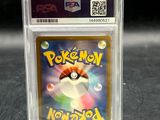 a close up of a pokemon trading card in a plastic holder