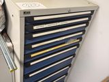 a drawer with many drawers in it in a room