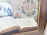 a painting of an open book and a vase on a table