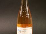 a bottle of wine that is sitting on a table