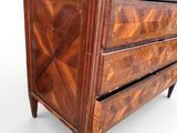 an image of a wooden chest of drawers on a white background