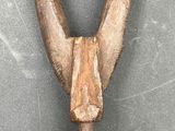 an image of a close up of a wooden object on a table