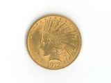 a gold coin with an indian head on it