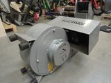 a machine that is sitting on the floor in a room