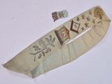 a piece of cloth with a design on it and a piece of cloth with a design on it