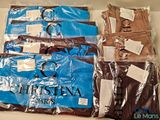 a lot of clothes that are wrapped in plastic bags