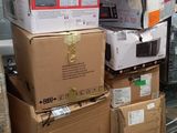 boxes stacked on top of each other on a pallet in a warehouse
