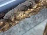 a close up of a metal object on a glass table