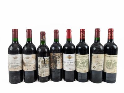 six bouteilles de vin sont alignées dans une rangée