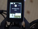 a smart device on the handlebar of a bike