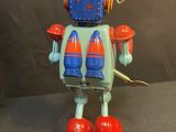 a toy robot that is sitting on a table