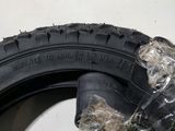 a tire that has been wrapped in plastic on the ground