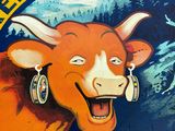 un panneau sur lequel figure l'image d'une vache