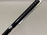 a pen that is sitting on top of a table