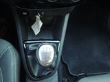 an image of a car ' s gear knob and gear lever
