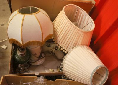 a box with three lamps and a lamp shade in it