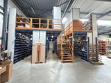 a large warehouse filled with lots of shelves and boxes
