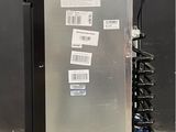 an image of a refrigerator with a lot of stickers on it