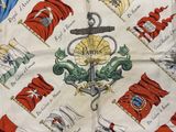 an image of a close up of a table cloth with a cross on it