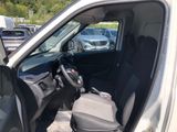 the interior of a car with the driver ' s seat folded down