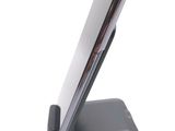 a close up of a cell phone on a stand
