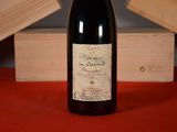 a bottle of wine that is sitting on a table