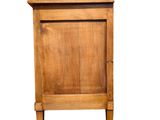 a small wooden cabinet with a drawer on top of it