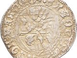 a close up of a coin on a white background