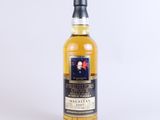 a bottle of whisky with a picture of a man on it
