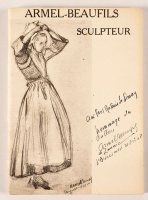 un vieux livre sur lequel figure le dessin d'une femme en robe