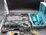 many tools in the back of a truck bed
