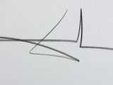 drawing of a sailboat on a white sheet of paper with a black marker