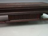 a wooden table with a drawer on top of it