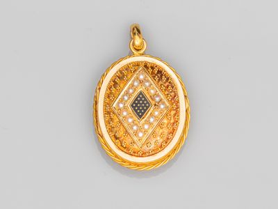 un pendentif en or 18 carats et diamants