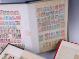 a lot of stamps on the pages of a book