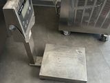 a machine that is sitting on the floor next to a machine