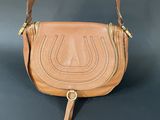 the chloe saddle bag in tan