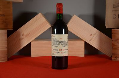 a bottle of wine that is sitting on a table