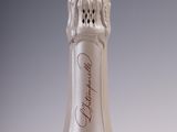 a bottle of wine that is sitting on a table