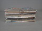 a stack of cds stacked on top of each other