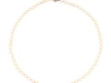 a white pearl necklace with a silver clasp on a white background