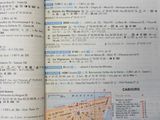 an open book with a map of a city in the middle of it
