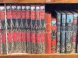 a book shelf with a lot of books on it