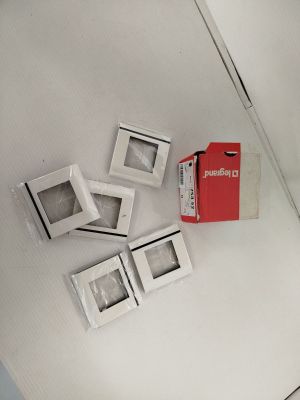 a box of cigarettes sitting on the floor next to a box of cigarettes