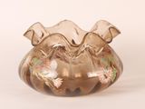 a glass vase that is sitting on a table