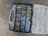 a tool box that has a bunch of screws in it