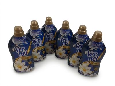 quatre bouteilles de lait à la vanille Veet sur fond blanc