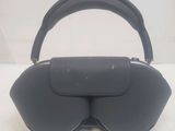 a black purse with a pair of glasses on top of it