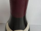 a bottle of wine that is sitting on a table