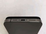 a close up view of the back of a black iphone